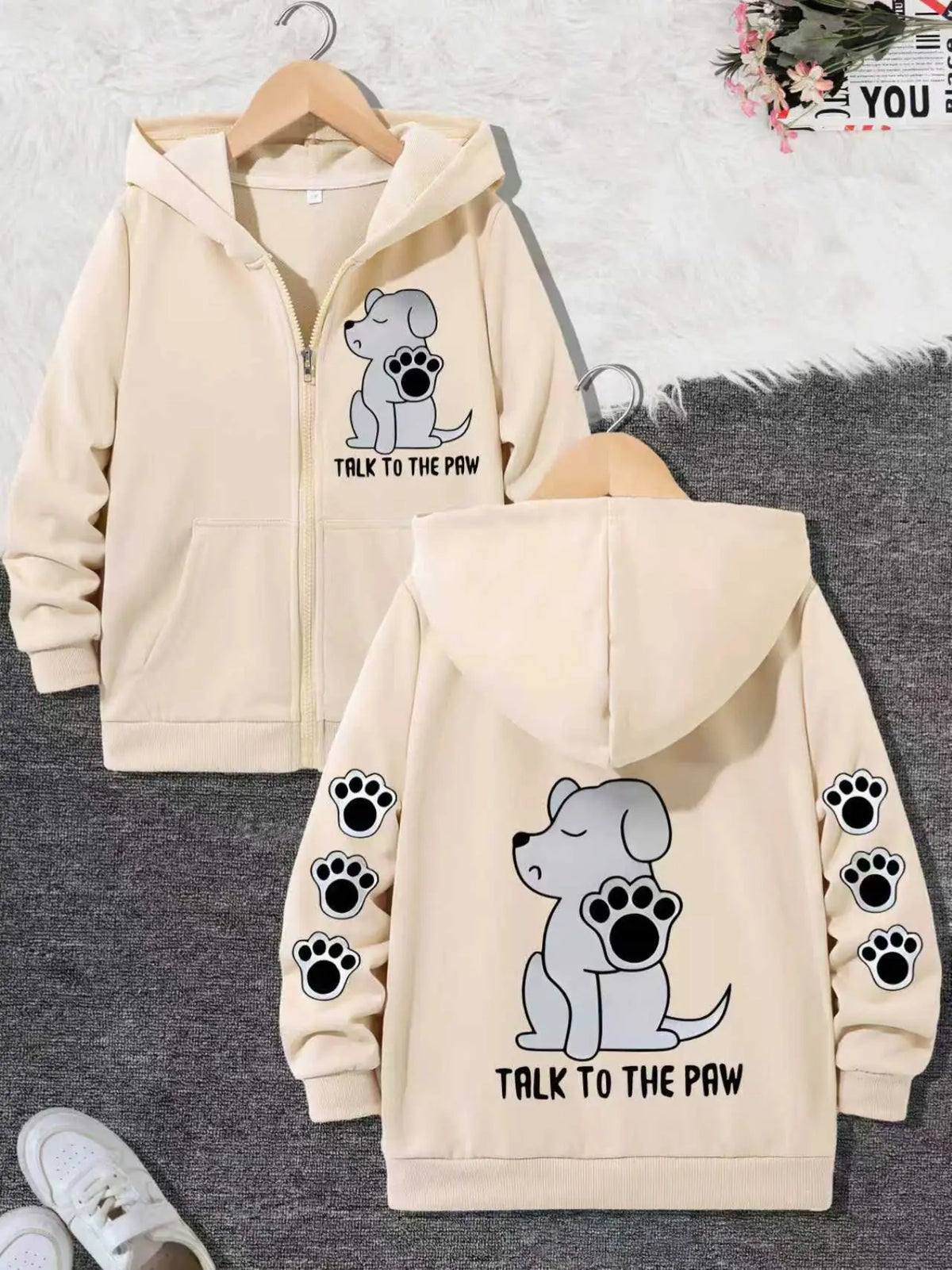 Meet your new favorite cozy statement piece – the “Talk to the Paw” Zip-Up Hoodie 🐾