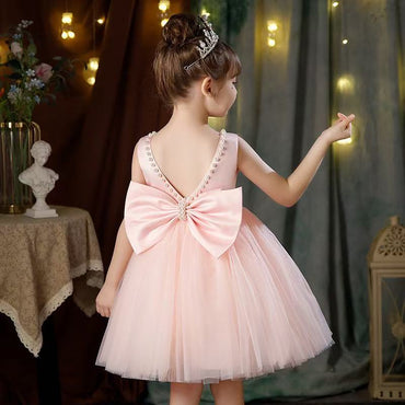 Make every moment magical with this enchanting girls’ tulle party dress