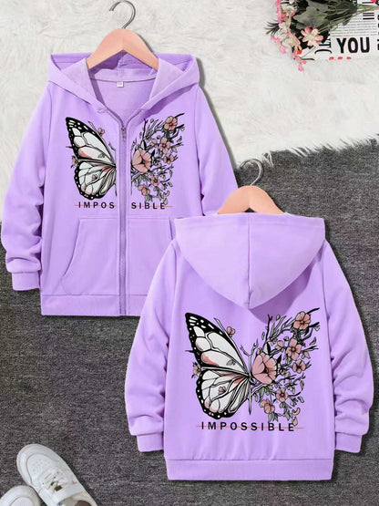 The eye-catching “IM-POSSIBLE” cream and purple zip-up hoodie.